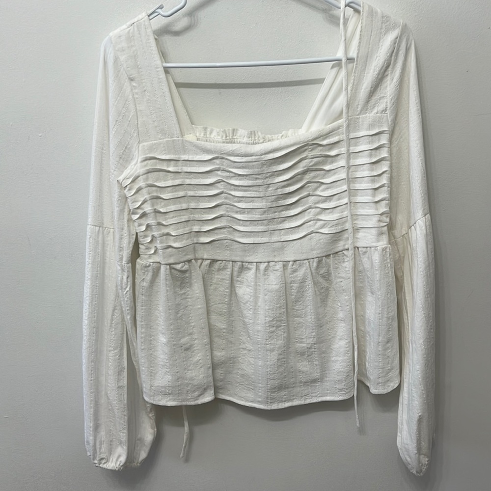 White baby doll blouse